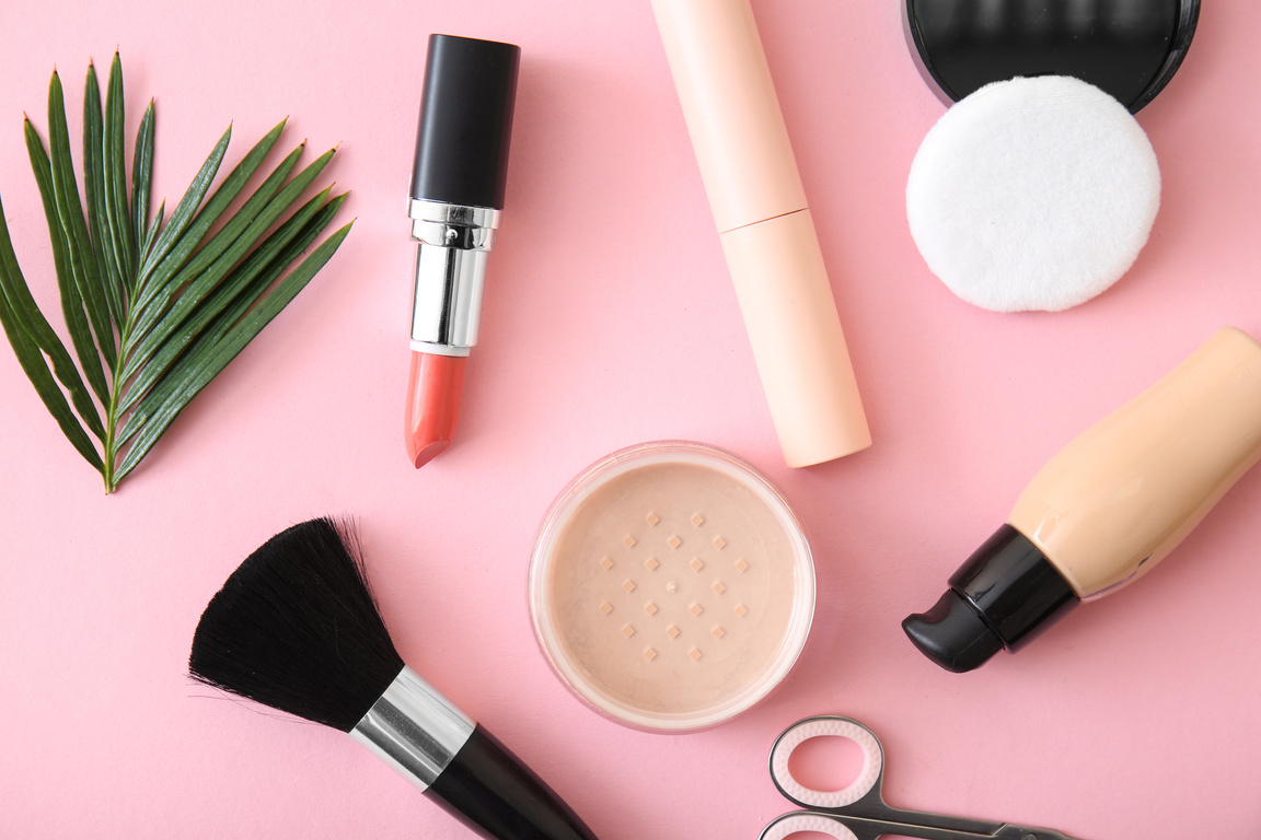 Set of Cosmetics with Accessories on Color Background